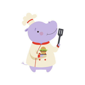 Cute hippo in chef uniform holding cupcake and spatula, cartoon animal character cooking vector Illustration on a white background