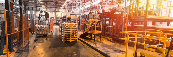 Fiberglass production industry equipment at manufacture background