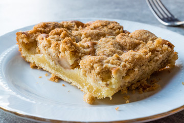 Homemade Apple Crumble Cake Slice with Fork.