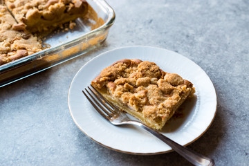 Homemade Apple Crumble Cake Slice with Fork.