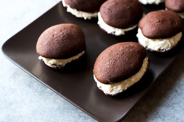 Homemade Chocolate Pies Filled with Vanilla Butter Cream.