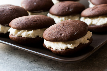 Homemade Chocolate Pies Filled with Vanilla Butter Cream.