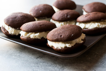 Homemade Chocolate Pies Filled with Vanilla Butter Cream.