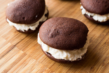 Homemade Chocolate Pies Filled with Vanilla Butter Cream.