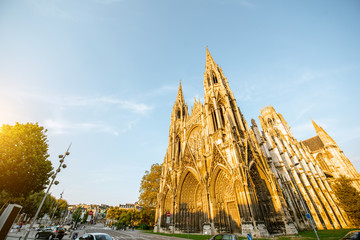 View on the gothic facade of the church of Saint-Ouen during the sunset in Rouen city, the capital...