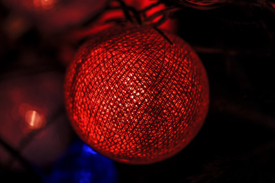 Glowing ball of on Christmas tree