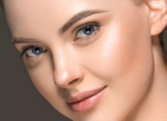 Beautiful skin woman face closeup healthy and beautiful female cosmetic concept