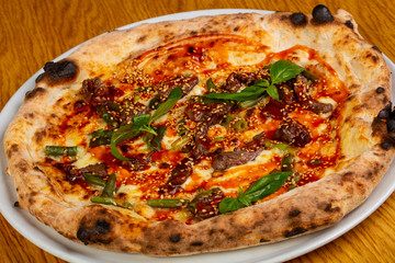 Pizza with beef