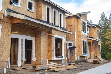 Wood townhouse building under construction
