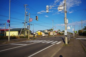 Fototapeta na wymiar 田舎町と信号