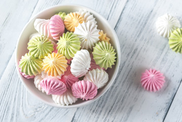 Bowl of colored meringues