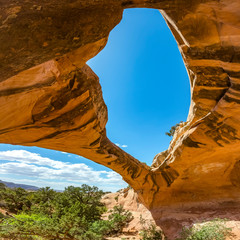 Uranium Arch in Moab Utah against a blue sky