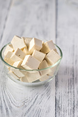Cut tofu in the glass bowl