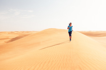 Fototapeta na wymiar Jogging In The Desert