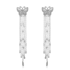 Pair of silver diamond earrings isolated on white