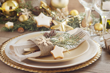 Christmas or New Year table setting.  Place setting for Christmas Dinner. Holiday Decorations.