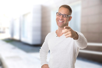 young boy with glasses and casual clothes