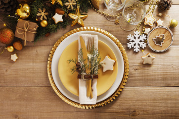Christmas or New Year table setting.  Place setting for Christmas Dinner. Holiday Decorations.
