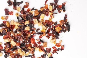 Still life, aromatic dry tea with fruits and petals
