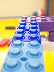 Colorful plastic blocks close up