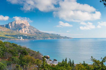 Fototapeta na wymiar Photo mountains and the sea scenic landscape on an autumn sunny day, the nature of the Crimean Peninsula