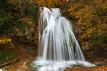 Fototapeta na wymiar Beautiful waterfall Dzhur-Dzhur in Crimea, autumn landscape