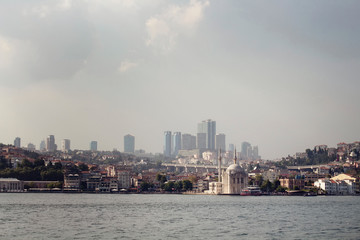 Fototapeta premium View of old, historical Ortakoy Mosque by Bosphorus and European side of Istanbul.