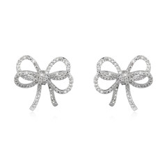 Pair of silver diamond earrings isolated on white