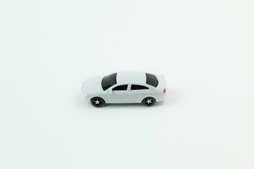 white car toy on white background image close up.