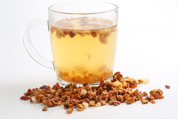 Still life, aromatic dry tea with fruits and petals