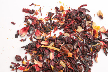 Still life, aromatic dry tea with fruits and petals