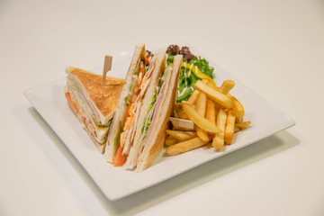  Chicken club sandwich with french fries