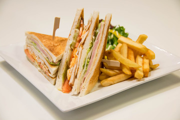  Chicken club sandwich with french fries