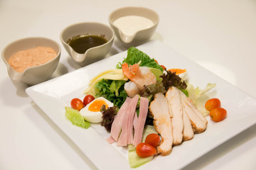 A mixed salad with sauce