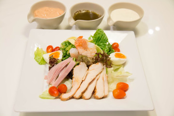 A mixed salad with sauce