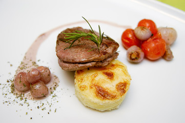 Slices Of Beef With Potatoes And Onions
