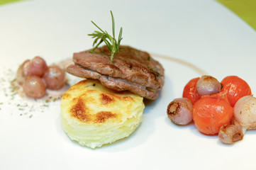 Slices Of Beef With Potatoes And Onions