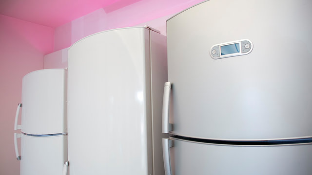 Refrigerators In Front Of A Pink Wall