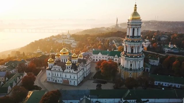 Golden foggy morning in Kiev Ukraine. Kiev Pechersk Lavra. Aerial drone video footage. Beautiful sunrise. popular tourist places