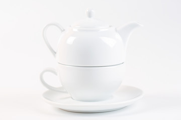 close up of empty cup of tea on white