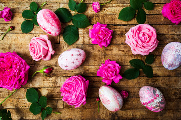 Easter eggs with fresh roses