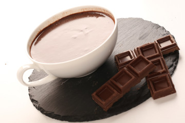 close up of dark hot chocolate cup on