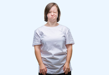 Fototapeta premium Young adult woman with down syndrome over isolated background winking looking at the camera with sexy expression, cheerful and happy face.