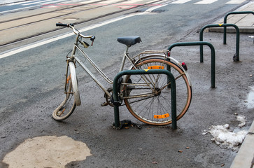 broken bike thrown on street in the city of Ghent in Belgium