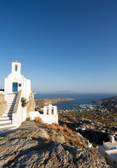 church of Agios Constantinos at the top of Chora town overlooking Lavadi, serifos Greece. - obrazy, fototapety, plakaty