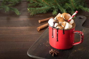 Printed kitchen splashbacks Chocolate Mug of hot chocolate and cacao with marshmallows with christmas tree branches on wooden board. Xmas holiday.