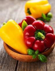 Bell peppers on a wooden background
