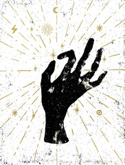 Black witch's hand with light rays and symbols of the elements of the cosmos