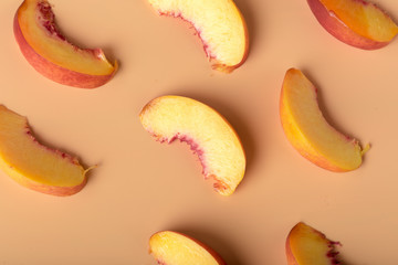Naklejka na ściany i meble Ripe peach fruit slice