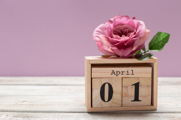 April 1st. Image of april 1 wooden color calendar on wooden background. Spring day